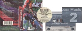 Mixed up (issued 1990). Front sticker. B-side tape print is different. "The Cure Mixed up" logo is black.