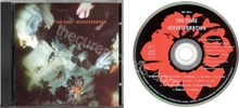 Disintegration (issued 2000). Red flower. Matrix says "Made in Germany by Universal M& L". - Thanks to rafacure.