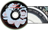 Disintegration (issued 2006). White flower and clear silver inner ring. Matrix says "Made in Germany by EDC". CD says "BIEM/MCPS" instead of "BIEM/STEMRA". Note the CD doesn't say "Made in Germany" or "Made in W. Germany".  - Thanks to rafacure.