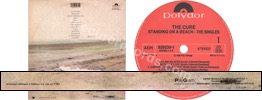 Standing on a beach � The singles (issued 1986). Second issue. Fold-out sleeve. Credits on backsleeve are sided. - Thanks to zakiaaa.