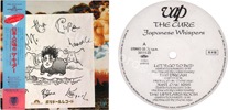 Japanese whispers (issued 1987). With promo card by Polydor Japan with a printed drawing of Robert Smith disguised like in Why can't I be you? videoclip and printed autographs from all Cure members..