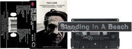 Standing on a beach  The singles (and unavailable b-sides) (issued 1986). Black plastic tape. Red logo on spine. 6-line credits under the barcode on sleeve. Cassette reads "Standing In A Beach". - Thanks to eyerawk.